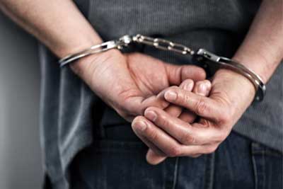 SLI - Criminal in handcuffs